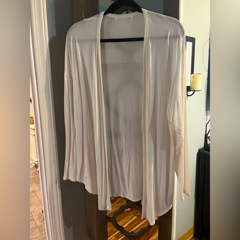 Thin off white cover jacket